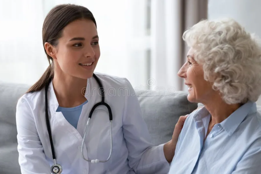 Doctor consulting with elderly woman